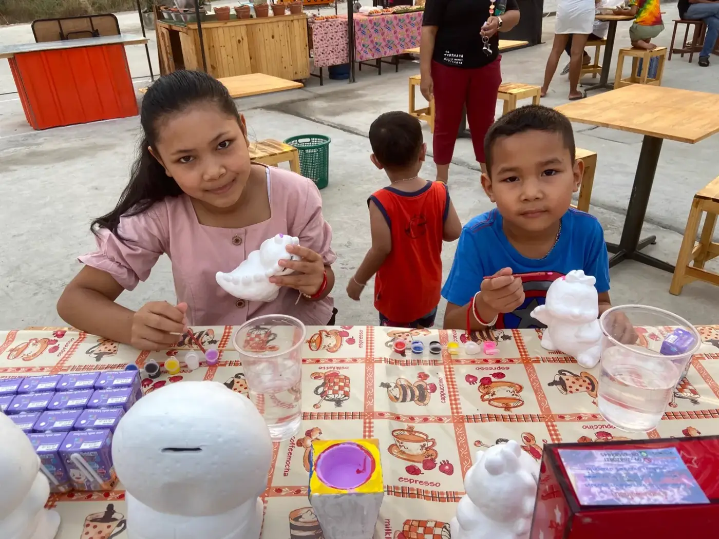 Kids painting together