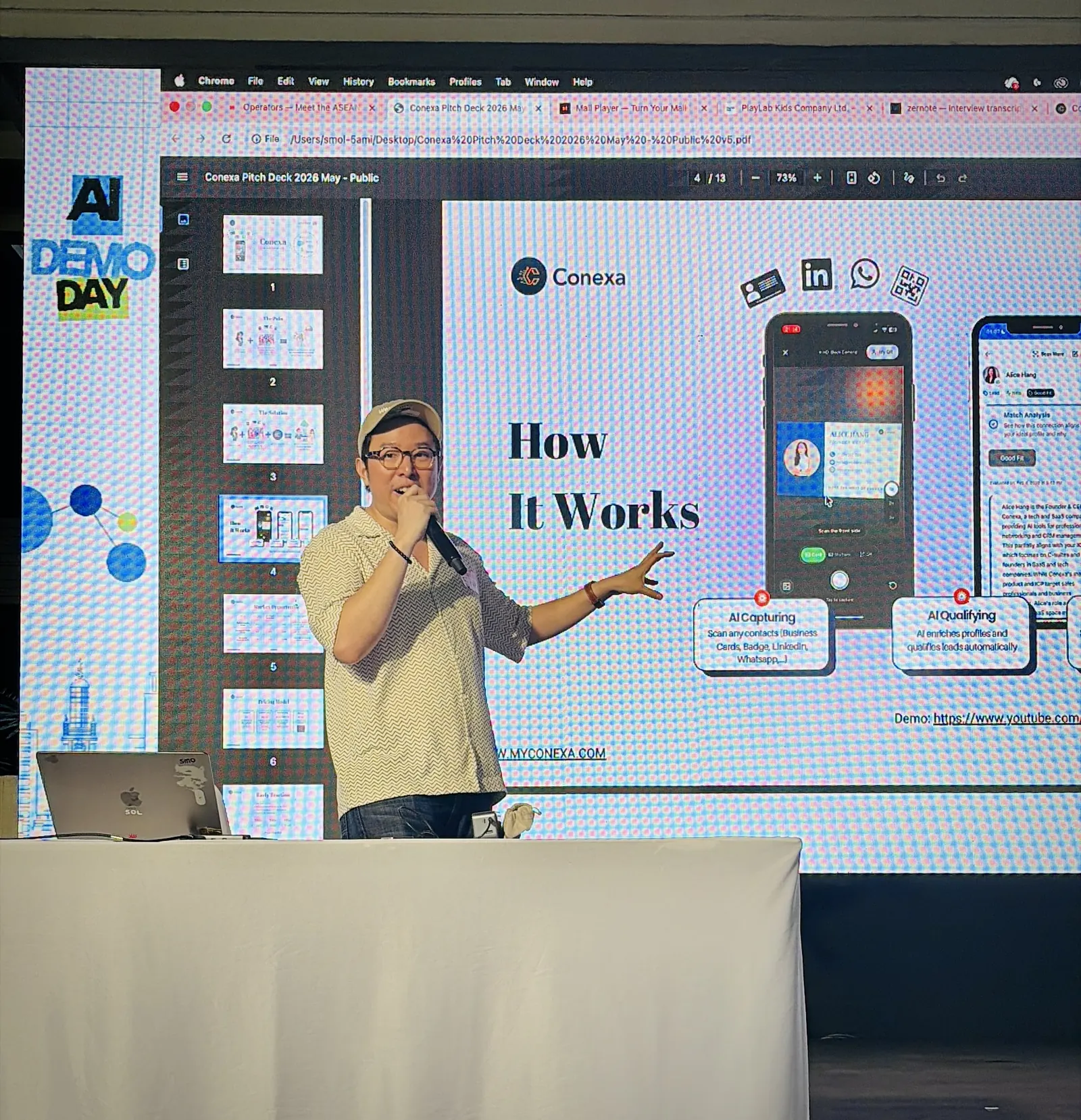 A founder pitching an AI product on stage at AI Demo Day